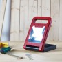 Faltbare LED-Arbeitsleuchte COB, 580 lm, rot/schwarz, mit Griff und Standfuß.