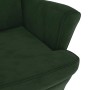 Detailaufnahme: Dunkelgrüner Ohrensessel mit Samtbezug, Teil eines Relaxsessel-Sets mit Hocker.