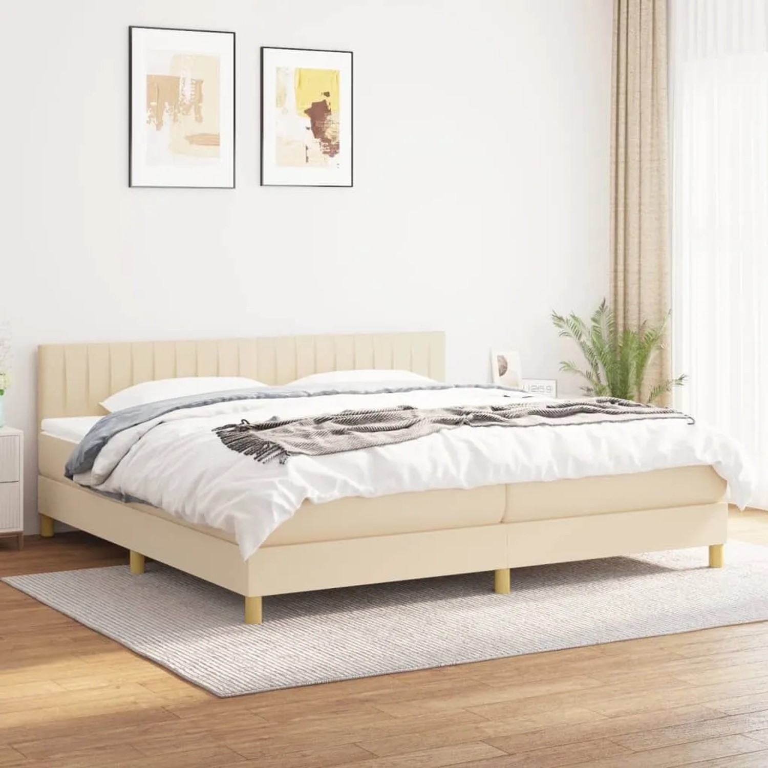 Cremefarbenes vidaXL Boxspringbett (200x200 cm) mit Matratze und Kopfteil.