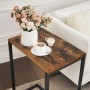 Songmics Couchtisch Barnet in Braun-Schwarz mit Getränken und Blumen auf Vintage-Oberfläche.