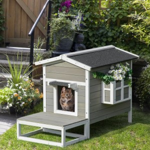 PawHut Katzenhaus mit Terrasse, Balkon und Katze im Eingang.