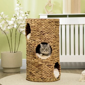 PawHut Kratzbaum Kratztonne mit 3 Höhlen und Katze im Inneren.