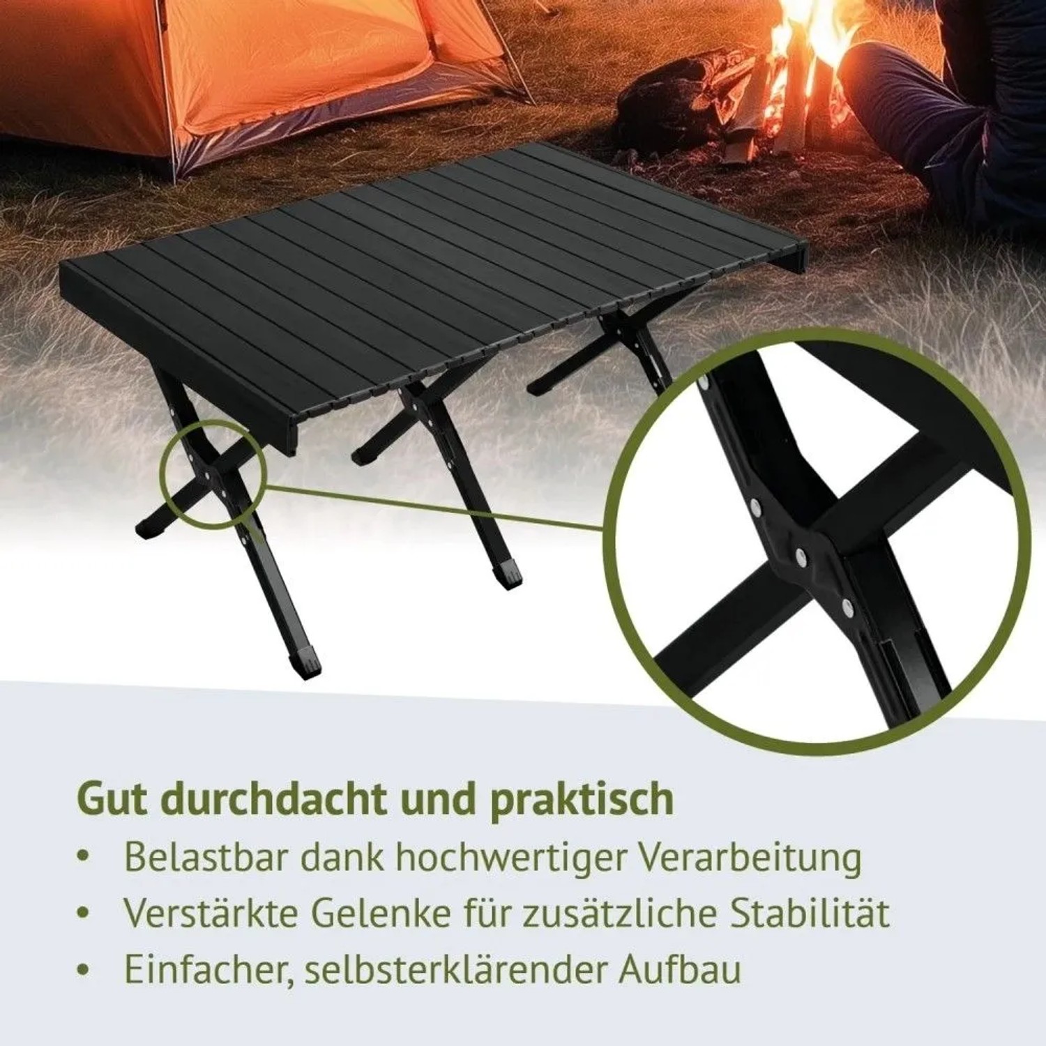 Schwarzer Jawinio Aluminium-Campingtisch, klappbar, mit verstärkten Gelenken, im Outdoor-Einsatz vor Zelt und Feuer.