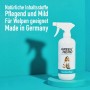 GreenHero Haustierpflege Spray gegen Juckreiz und Milben, weiße Sprühflasche vor blauem Hintergrund.