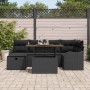 Schwarzes 7-teiliges vidaXL Garten-Sofa-Set aus Polyrattan mit Tisch und bequemen Kissen.