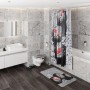 Modernes Bad mit Sanilo WC-Sitz Elegance, Duschvorhang und Badematte mit Stein-Motiv.