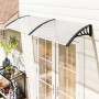 Transparentes Outsunny Pultvordach aus Polycarbonat über einer Tür. Gebogener Wetterschutz für Türen und Fenster.