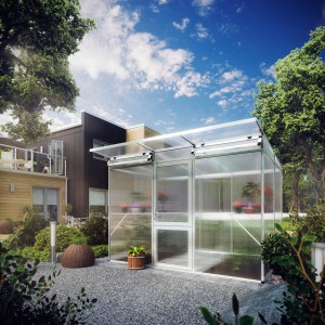 KGT Gewächshaus Linea Alu blank, 6,06 m², im Garten mit Pflanzen und grauen Steinen.