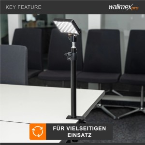 Walimex Pro Tischstativ mit LED-Licht, an weißem Tisch geklemmt. Höhenverstellbares Lampenstativ für Studio & Home-Office.