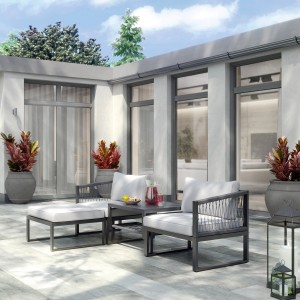 4-teiliges Lounge-Set Willa aus Aluminium in Anthrazit mit grauen Auflagen und Kissen.