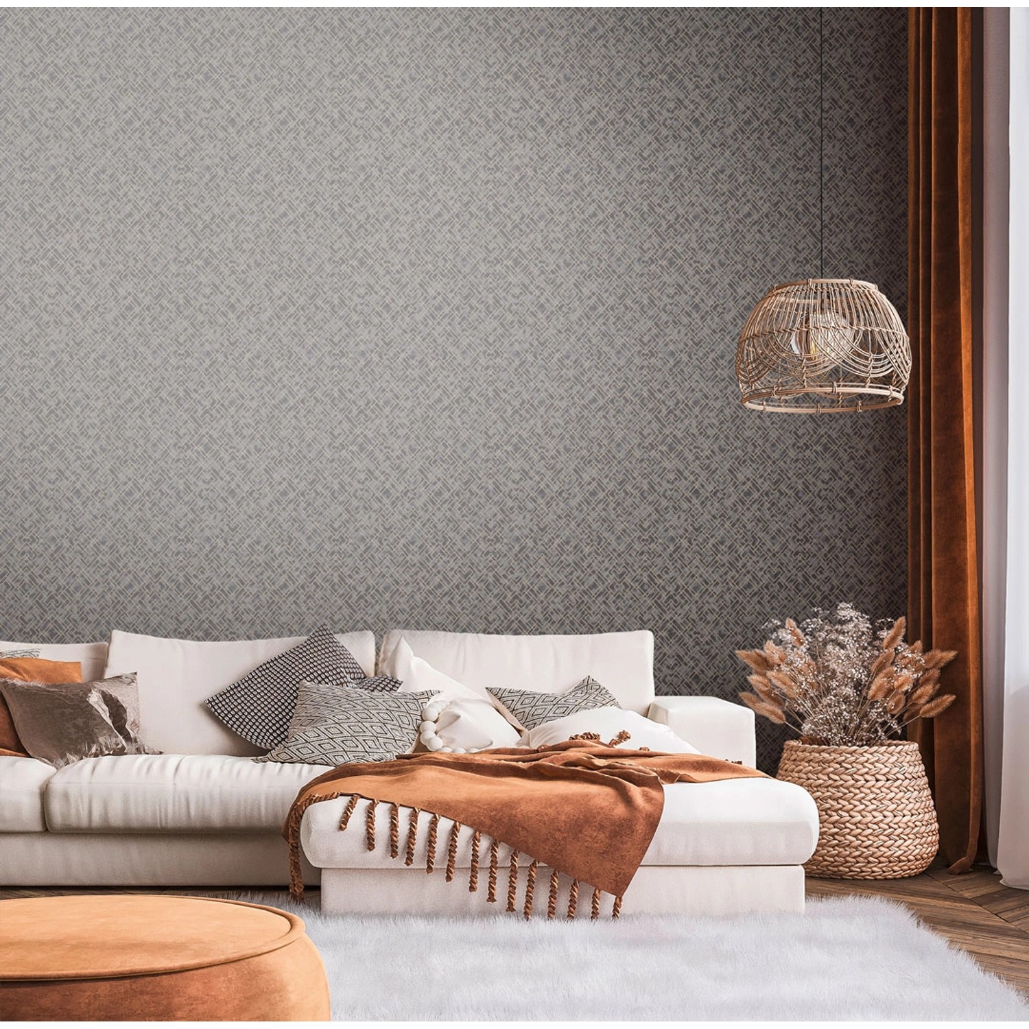 AS-Creation Vliestapete Grafisch Schwarz/Gold im Wohnraum mit Sofa und Deko.