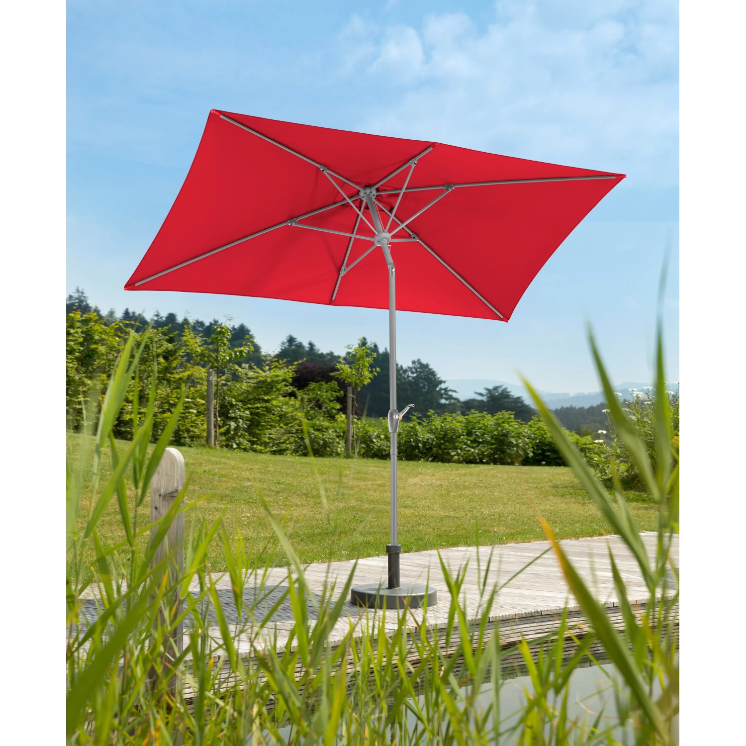 Roter Schneider Marktschirm (300x200 cm) mit Knickfunktion im Garten.