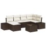 Braunes 7-teiliges Garten-Sofa-Set mit creme-farbenen Kissen aus Poly Rattan und Tisch.