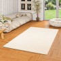 Cremefarbener Snapstyle Hochflor Teppich Mona, 200x300 cm, im Wohnzimmer auf Parkettboden.
