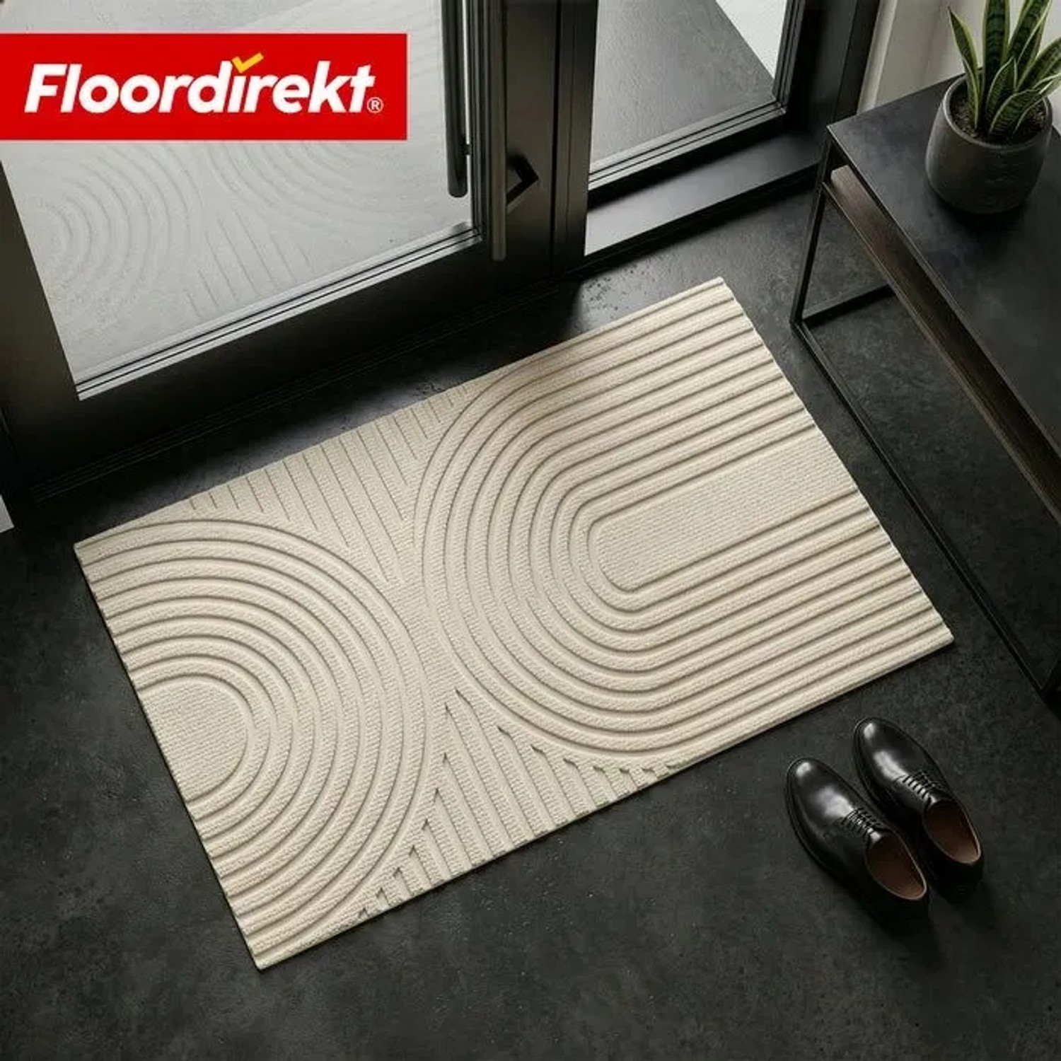 Beige Schmutzfangmatte CIRCA mit Wellenmuster, 40x60 cm, rutschfest und waschbar.