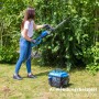 Anwendung: Güde Stromerzeuger GSE 951 betreibt Heckenschere im Garten.
