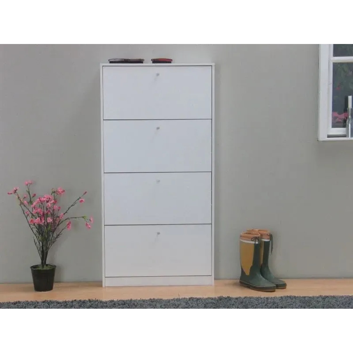 Weißer ebuy24 Schuhschrank Escape mit 4 Klappen für Flur oder Hauswirtschaftsraum.