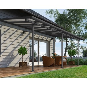 Anthrazit Terrassenüberdachung Feria 3x6.10 m am Haus mit Sitzgruppe auf Holzterrasse.