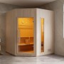 Finnische Eck-Sauna Kotka aus hellem Naturholz mit Glastür und Zubehör im modernen Bad. 180 cm.