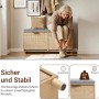 SoBuy Schuhbank FSR211-N mit Sitzfläche, Schuhschrank mit 2 Klappen in Holzoptik. Frau sitzt drauf und bindet Schuhe.