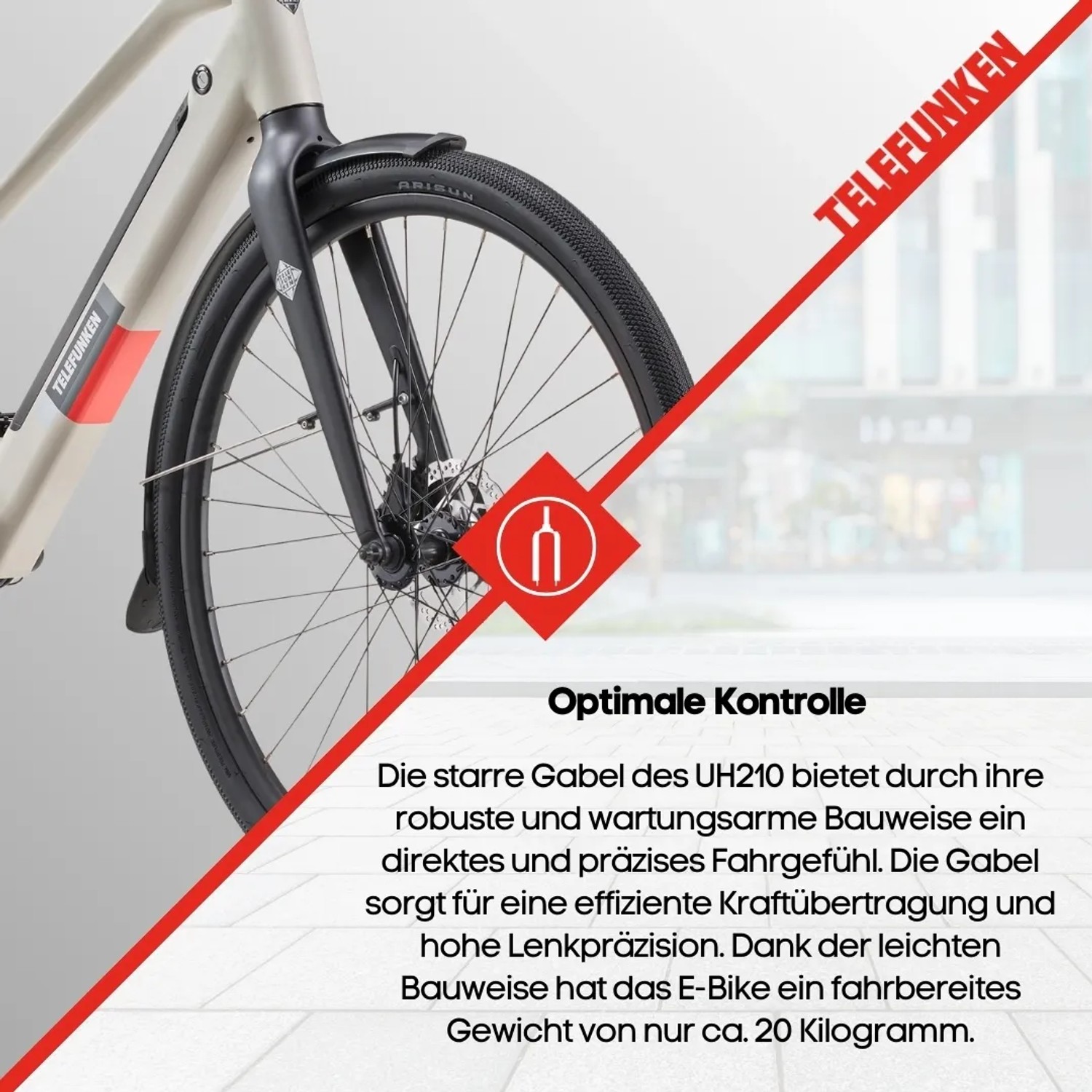 Detailaufnahme des Telefunken UH210 E-Bike in Seidengrau, Fokus auf Vorderrad und Gabel.