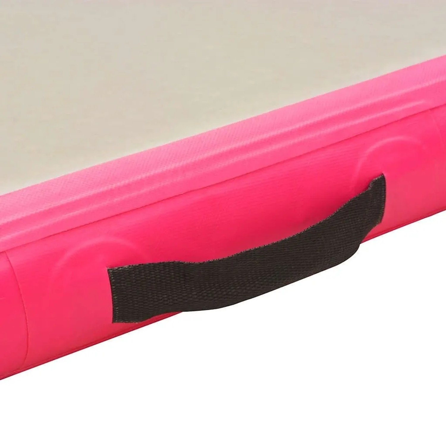 Nahaufnahme der rosa aufblasbaren Gymnastikmatte aus PVC mit schwarzem Tragegriff. Perfekt für Sport & Fitness.