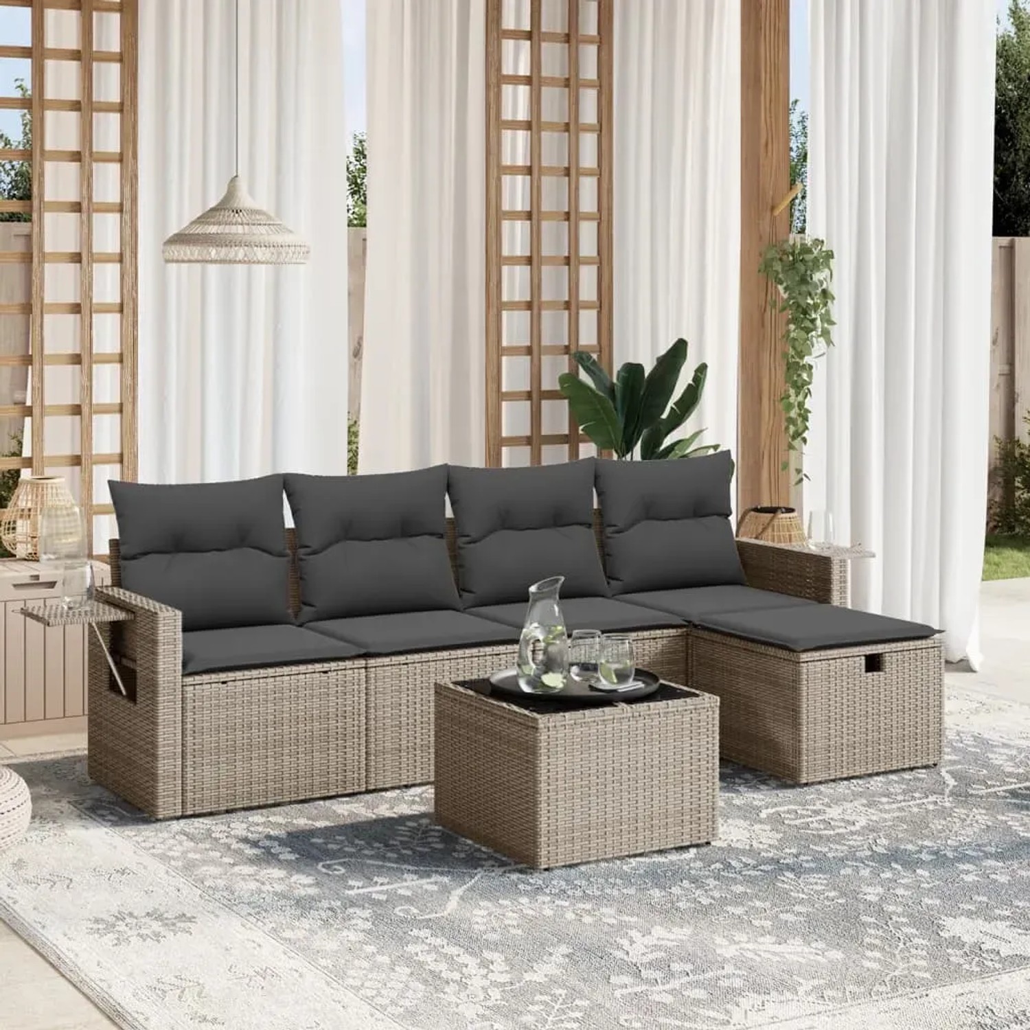 Graue 6-tlg. Garten-Sofagarnitur aus Polyrattan mit Kissen und Tisch für Terrasse oder Garten.
