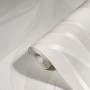 Beige Vliestapete mit grafischem Wellenmuster von Marburg, Rolle angeschnitten.