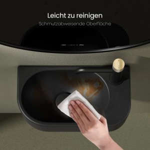 Reinigung eines mattschwarzen Emke Handwaschbeckens aus Keramik mit rechtem Hahnloch.