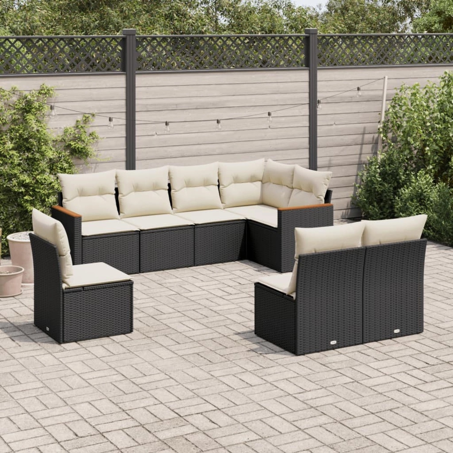 Schwarze 8-tlg. vidaXL Garten-Sofagarnitur aus Rattan mit cremefarbigen Kissen.