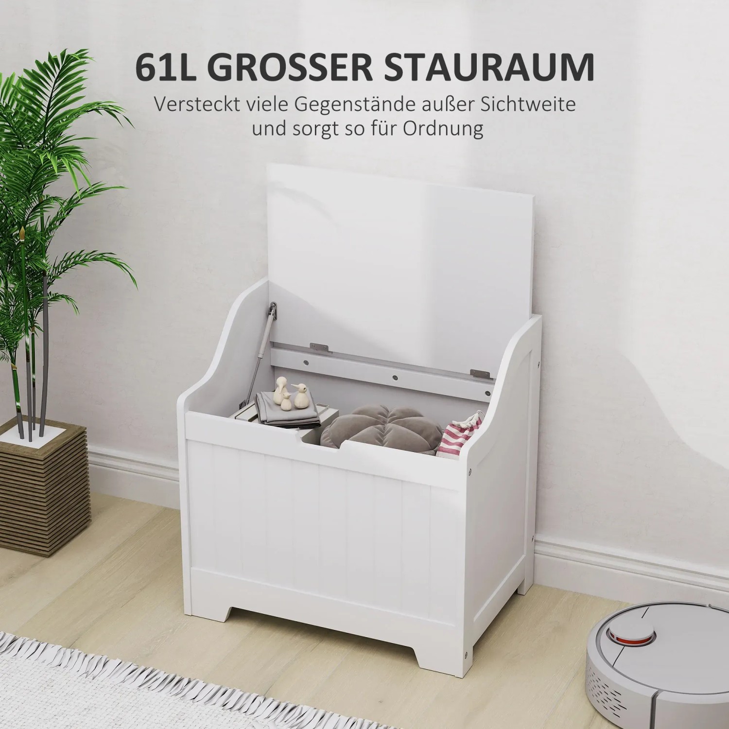 Weiße HOMCOM Truhe/Auflagenbox mit offenem Deckel, gefüllt mit Kissen und Spielzeug.