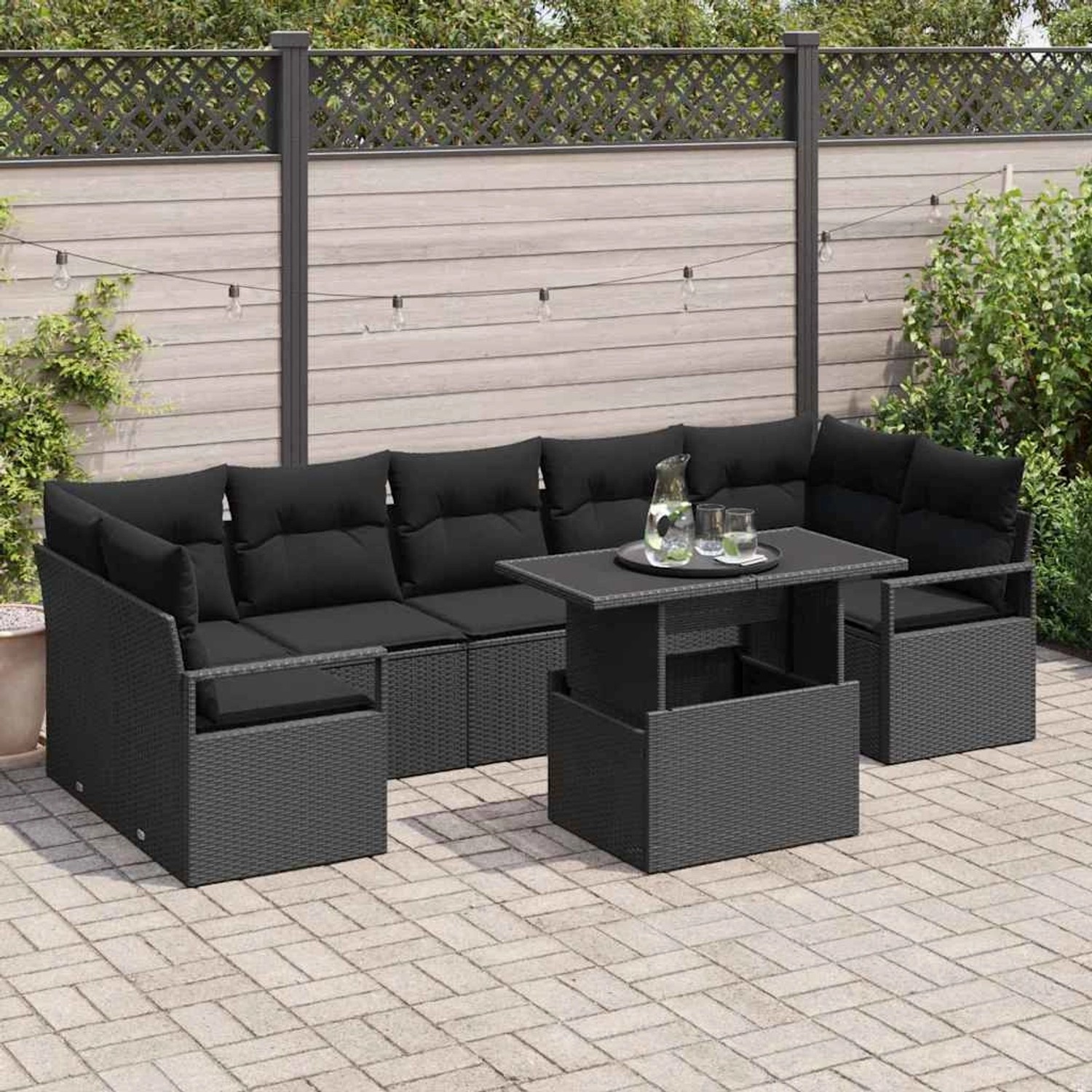 Schwarzes 8-tlg. vidaXL Garten-Sofa-Set aus Poly Rattan mit Tisch und Auflagen.