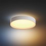 Weiße Philips Hue Deckenleuchte Devere M mit Dimmer, leuchtend an der Decke.