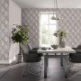 Wohnraum mit Guido Maria Kretschmer Vliestapete Prisma in Taupe mit 3D-Effekt.