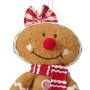 Lebkuchenfigur aus Stoff als Weihnachtsdeko mit Schleife und Schal.