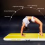 Gelbe CCLIFE Airtrack Matte mit Turnerin in Brücke. Rutschfest, wasserdicht, geräuschdämpfend für Gymnastik & Training.