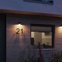 Anthrazitfarbene Paulmann LED-Außenwandleuchte Flame an einer Hauswand mit der Hausnummer 21.