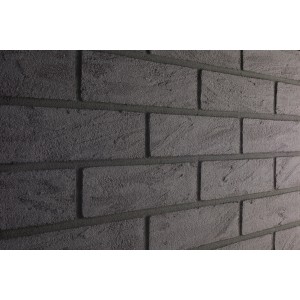Anthrazitfarbene Elabrick Verblender Madagaskar (7,1x24 cm) im Mauerverband.