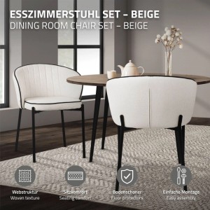 Vier beige Esszimmerstühle mit Stoffbezug, schwarzen Metallbeinen und runder Rückenlehne an einem Holztisch. Modern & bequem.