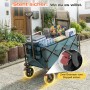 Grüner, faltbarer Bollerwagen Sunula mit Lebensmitteln und Campingzubehör beladen.