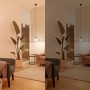 Philips WIZ E27 Glühbirne in Wohnraum-Szene mit warmem und kühlem Licht.