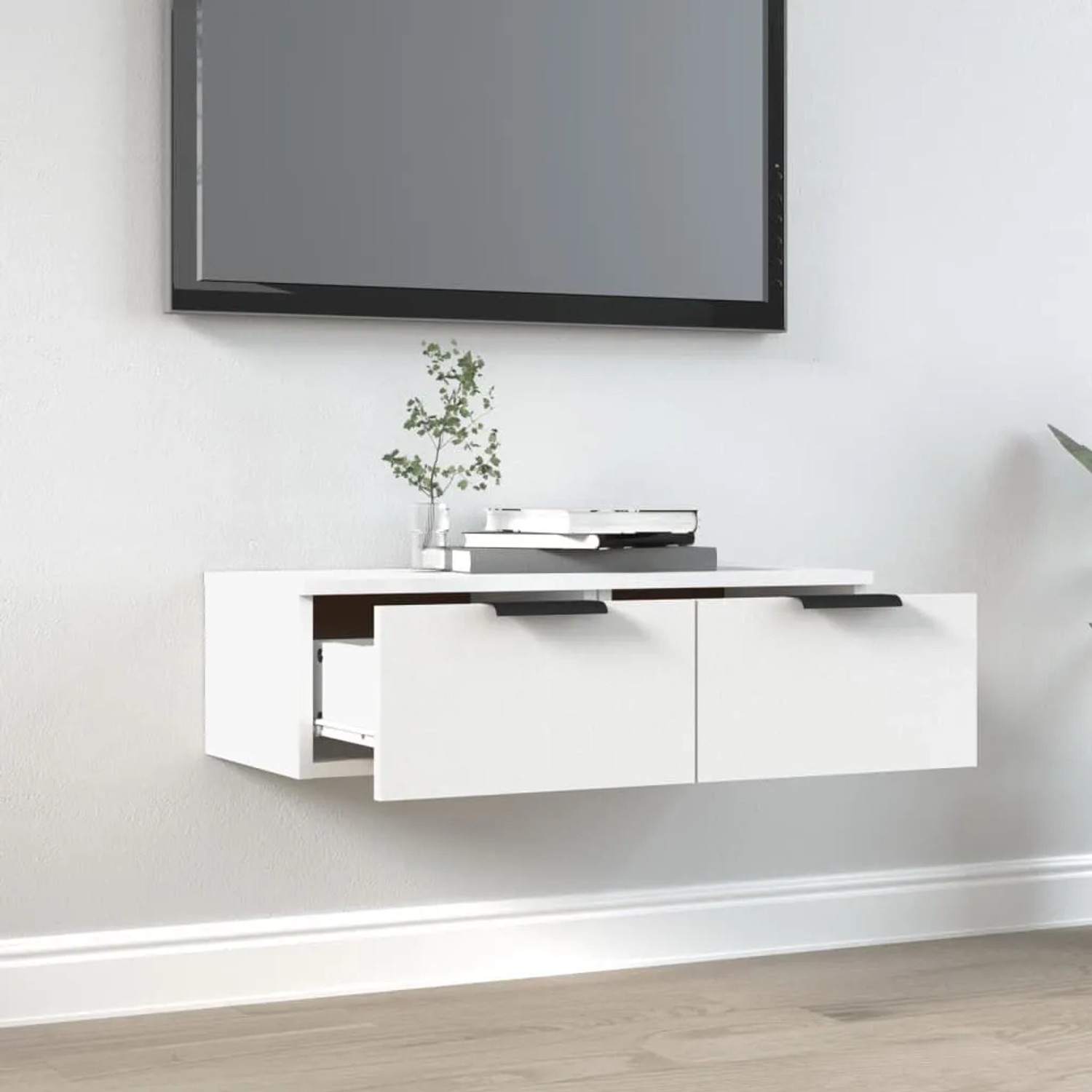 Weißer vidaXL Wandschrank (68x30x20 cm) aus Holzwerkstoff als TV-Schrank im Wohnzimmer.