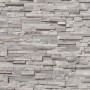 Graue Vliestapete in Steinoptik mit 3D-Effekt für Wohnzimmer und Küche.