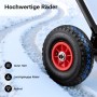 Detailansicht des robusten, schwarzen Pneumatikrads eines Wiltec Schneeschiebers auf verschneitem Weg. Rotes Rad, guter Halt.