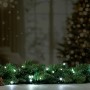 Zweifarbige LED-Lichterkette (kalt/warmweiß) mit Tannengrün und Zapfen, ideal für den Außenbereich.