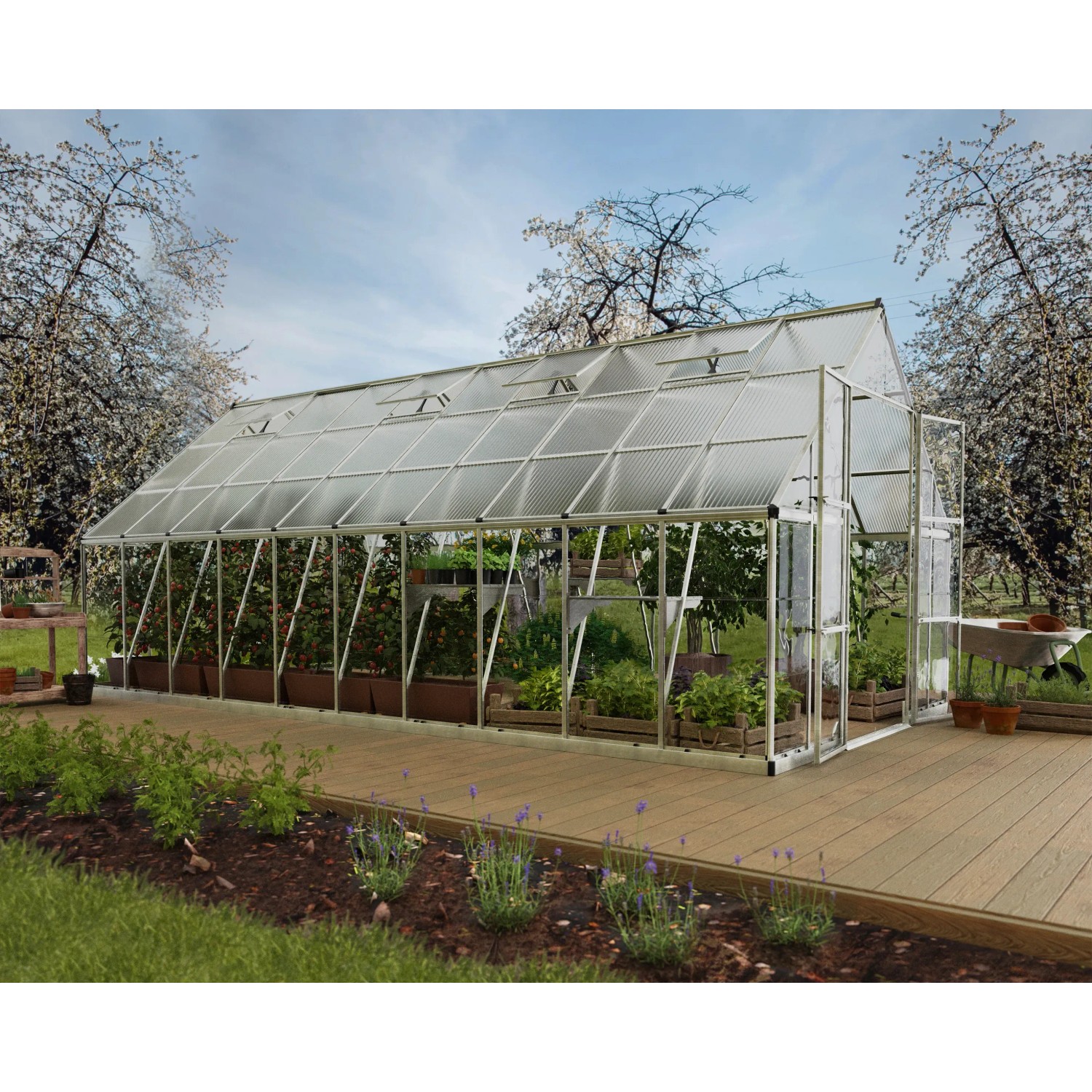 Silbernes Palram Canopia Balance Gewächshaus (257x304x604cm) mit Pflanzen im Garten.