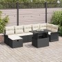 Schwarzes 8-teiliges Garten-Sofa-Set aus Poly Rattan mit Kissen und Tisch.