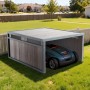 Graue Mähroboter Holzgarage mit Flachdach aus Massivholz im Garten. Bietet Schutz für den Rasenroboter.
