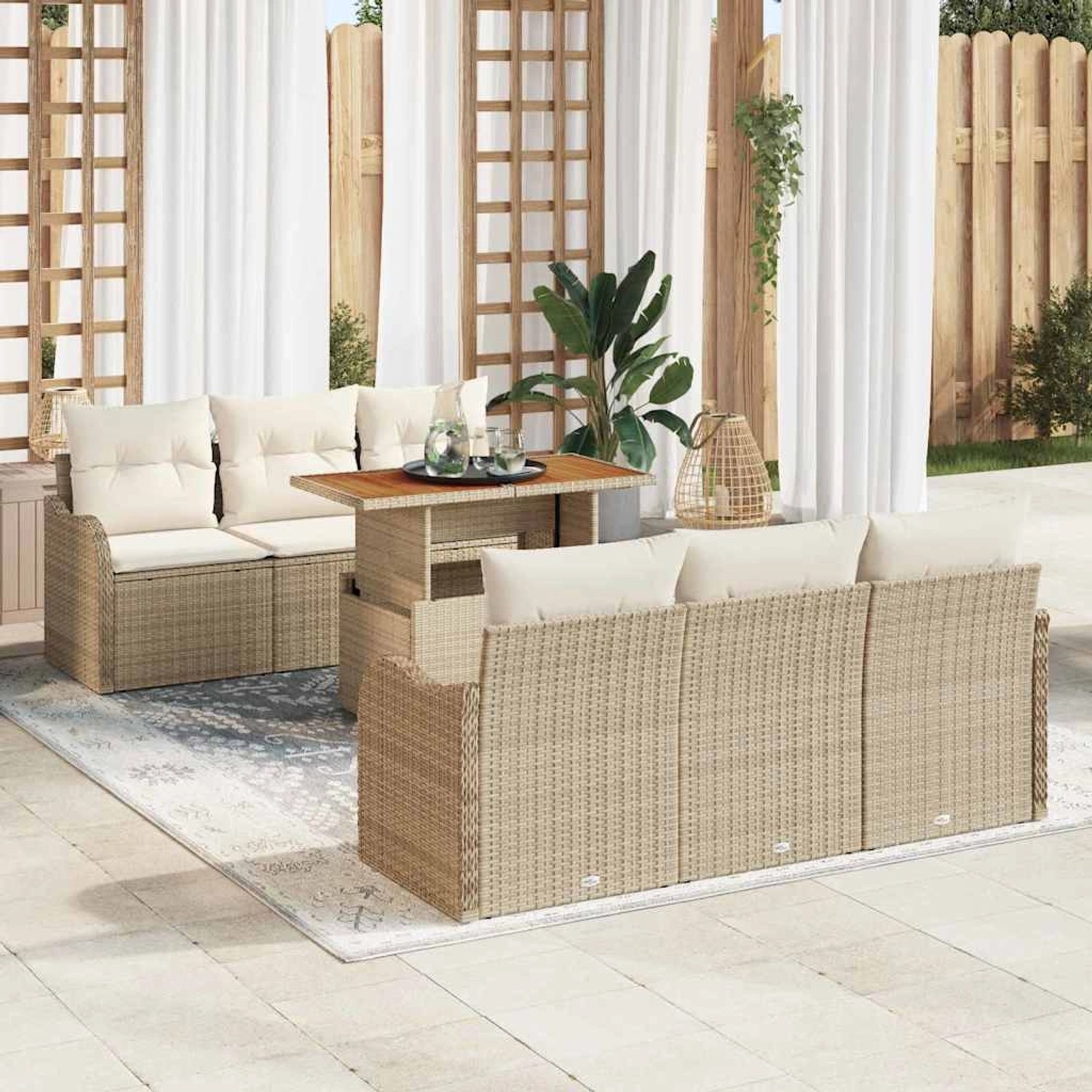 Beiges 7-teiliges Garten-Sofa-Set aus Poly Rattan mit Tisch und Stauraum.