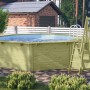Karibu Holzpool Set mit Sonnenterrasse, Filteranlage und Leiter.